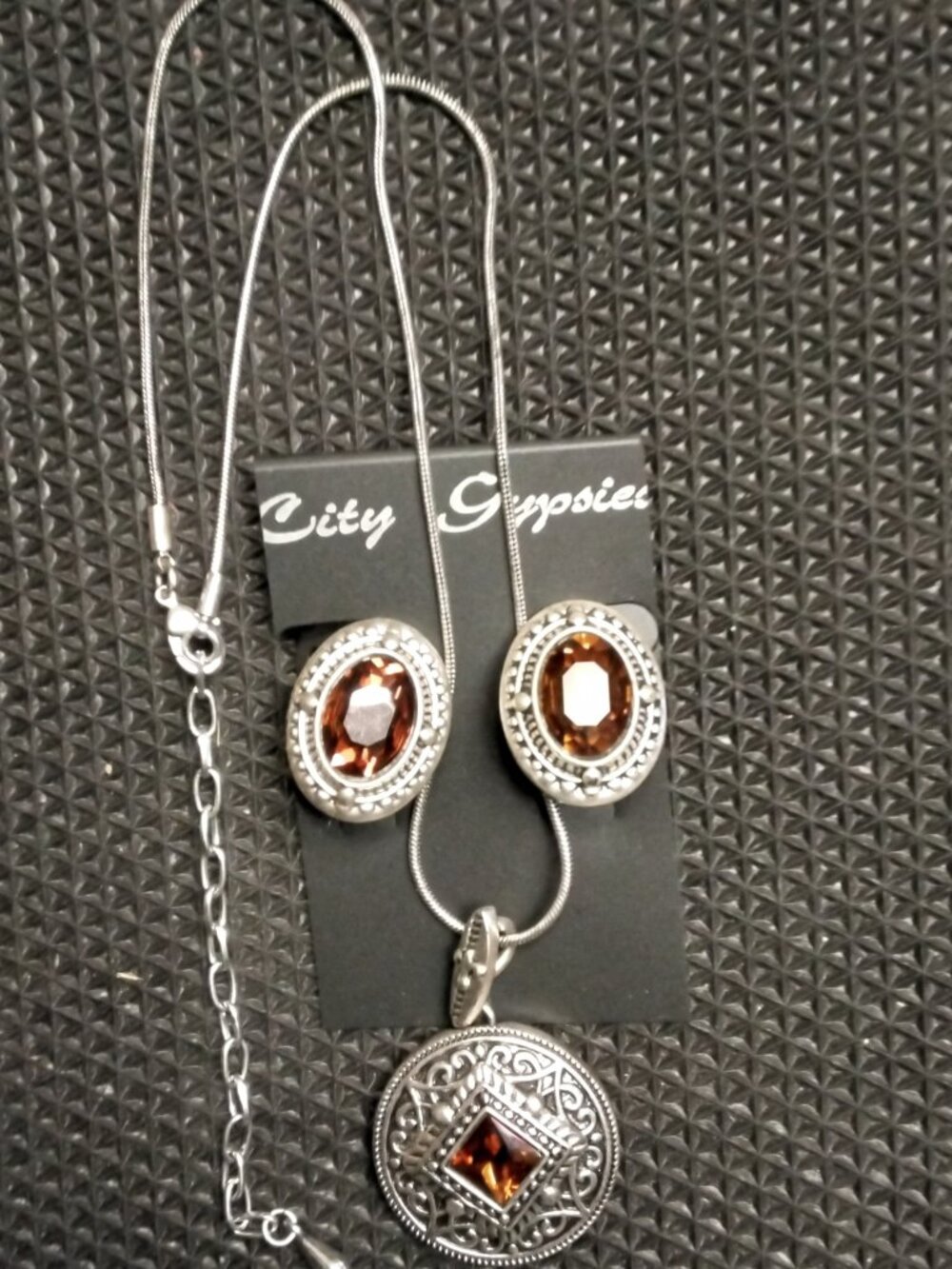 Silvertone necklace and clip-on earrings